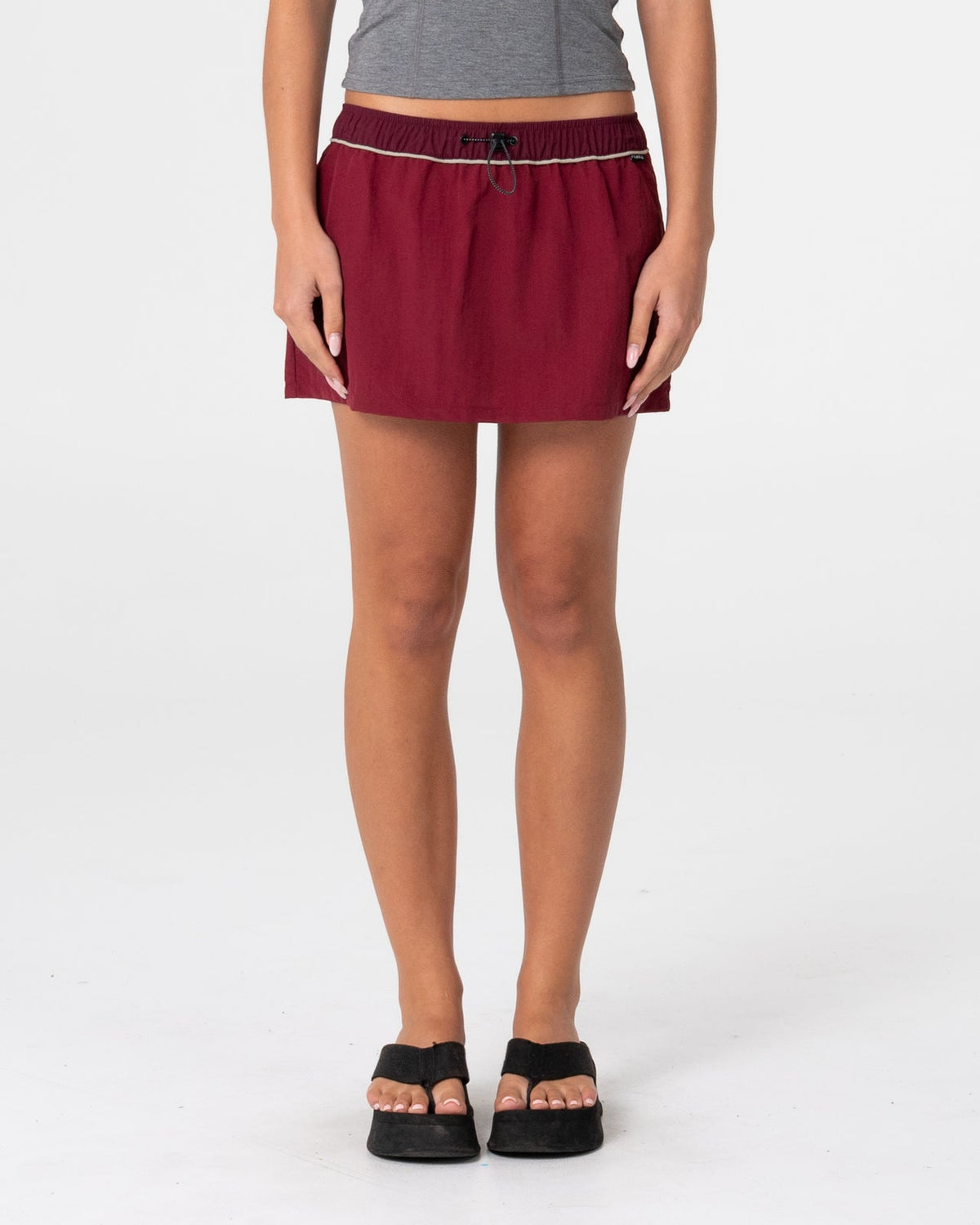 RUSTY — BREEZY WIND CHEATER MINI SKIRT